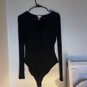 Black body suit with lace-up front (M)